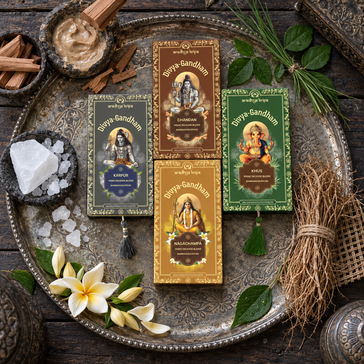 Four boxed sets of Divyagandham Vedic incense sticks featuring Chandan (Sandalwood) and Karpur (Camphor) for Lord Shiva puja, Naga Champa for Maa Parvati (Devi) worship, and Khus (Vetiver) for Lord Ganesha puja, arranged side by side.