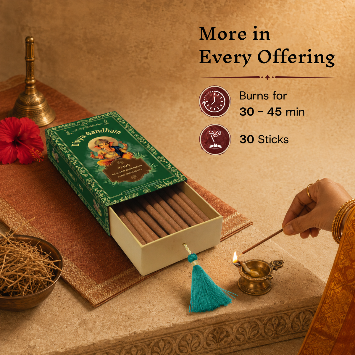 Open Divyagandham Khus incense box showing a 30-unit count and a 30 to 45-minute burn time as a hand lights a stick in the foreground.