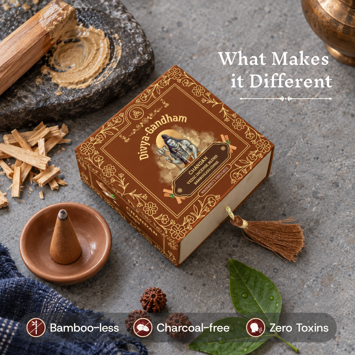 Divyagandham Chandan incense cones box emphasizing its bamboo-less, charcoal-free, and zero toxins qualities, set near a lit cone, sandalwood chips, and a rudraksha.