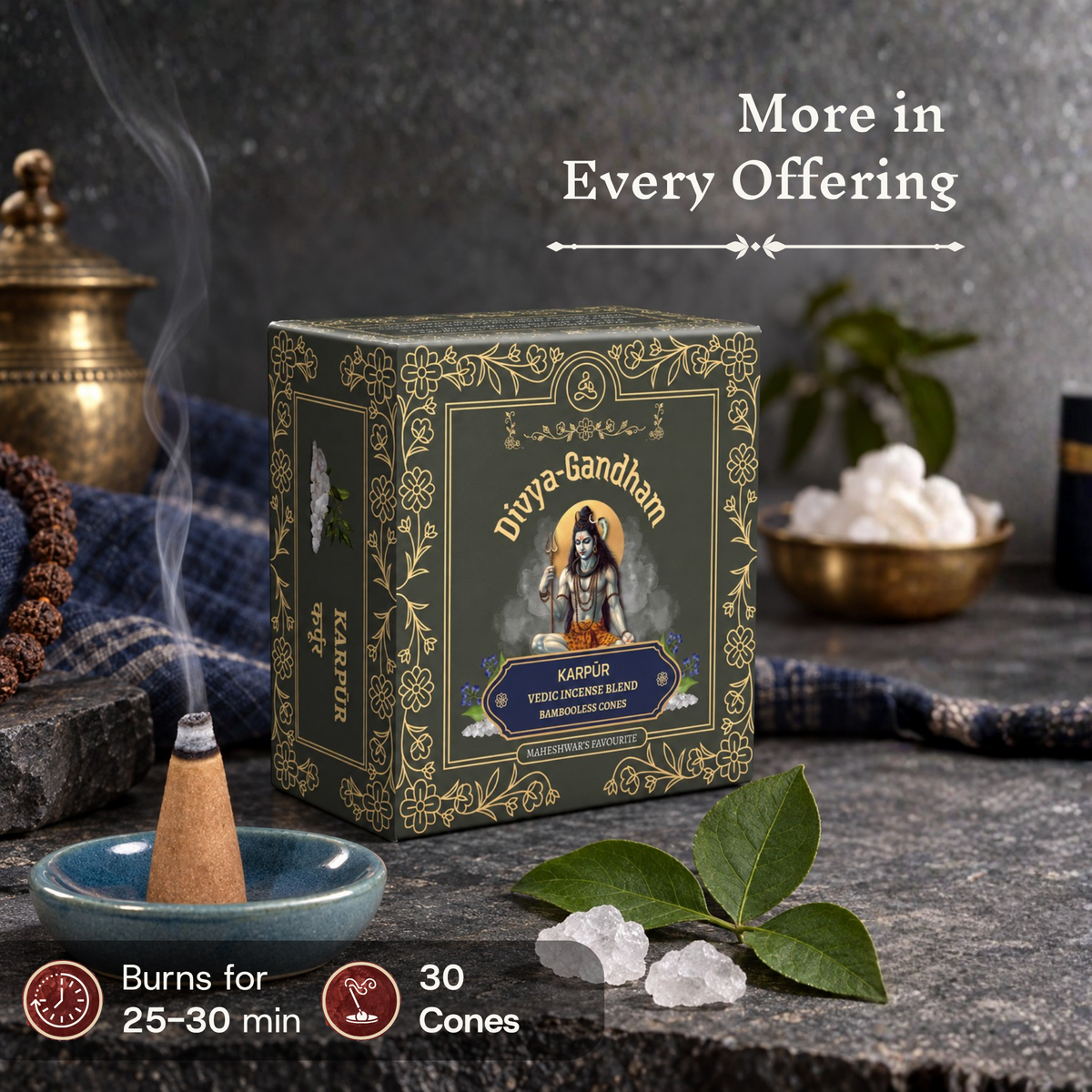 Lit Divyagandham Karpur incense cone next to the product box detailing a 30-cone count and a 25 to 30-minute burn time alongside a fresh bel leaf and camphor crystals.