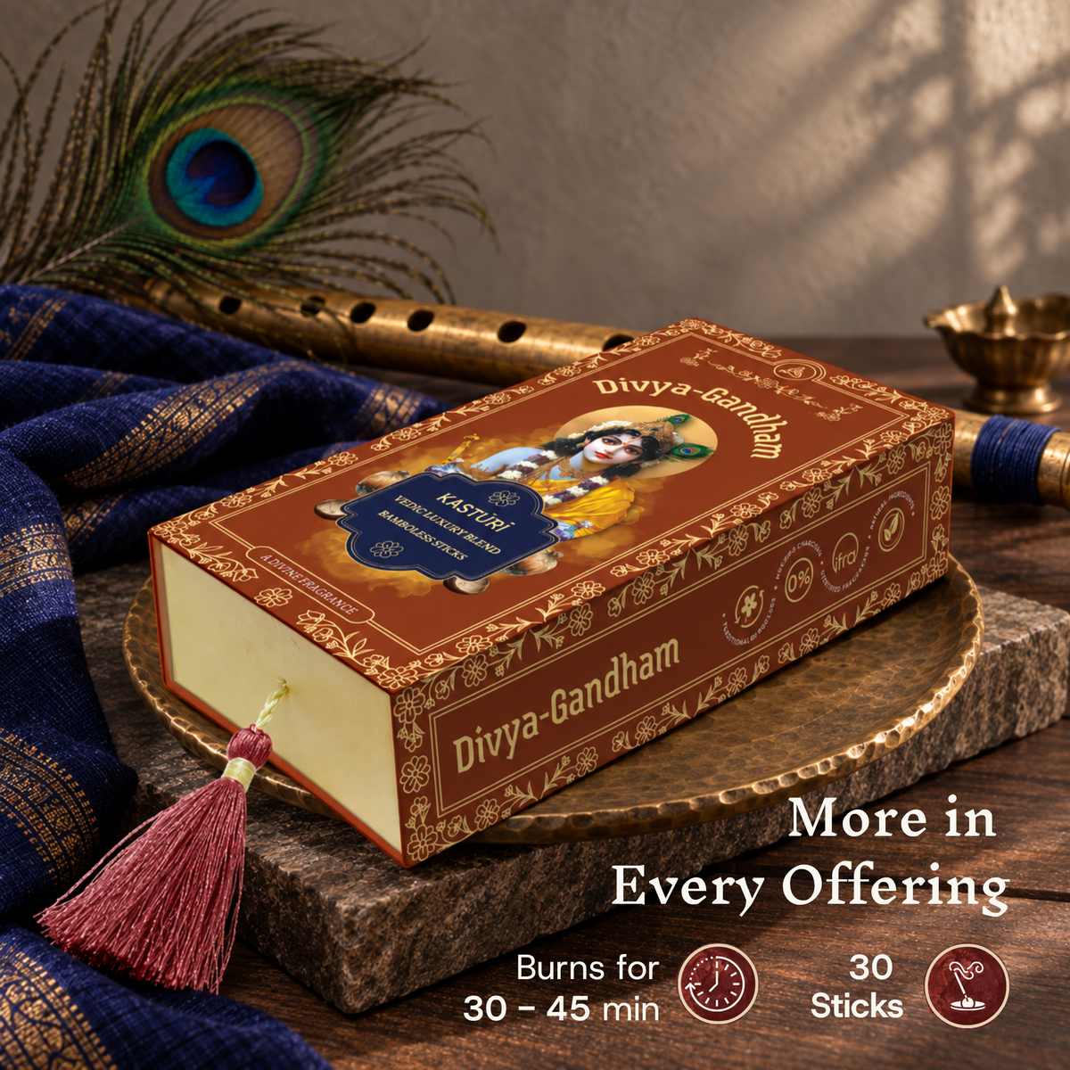 Divyagandham Kasturi incense sticks box detailing a 30-stick count and a 30 to 45-minute burn time alongside a wooden flute, lit diya, and peacock feather.