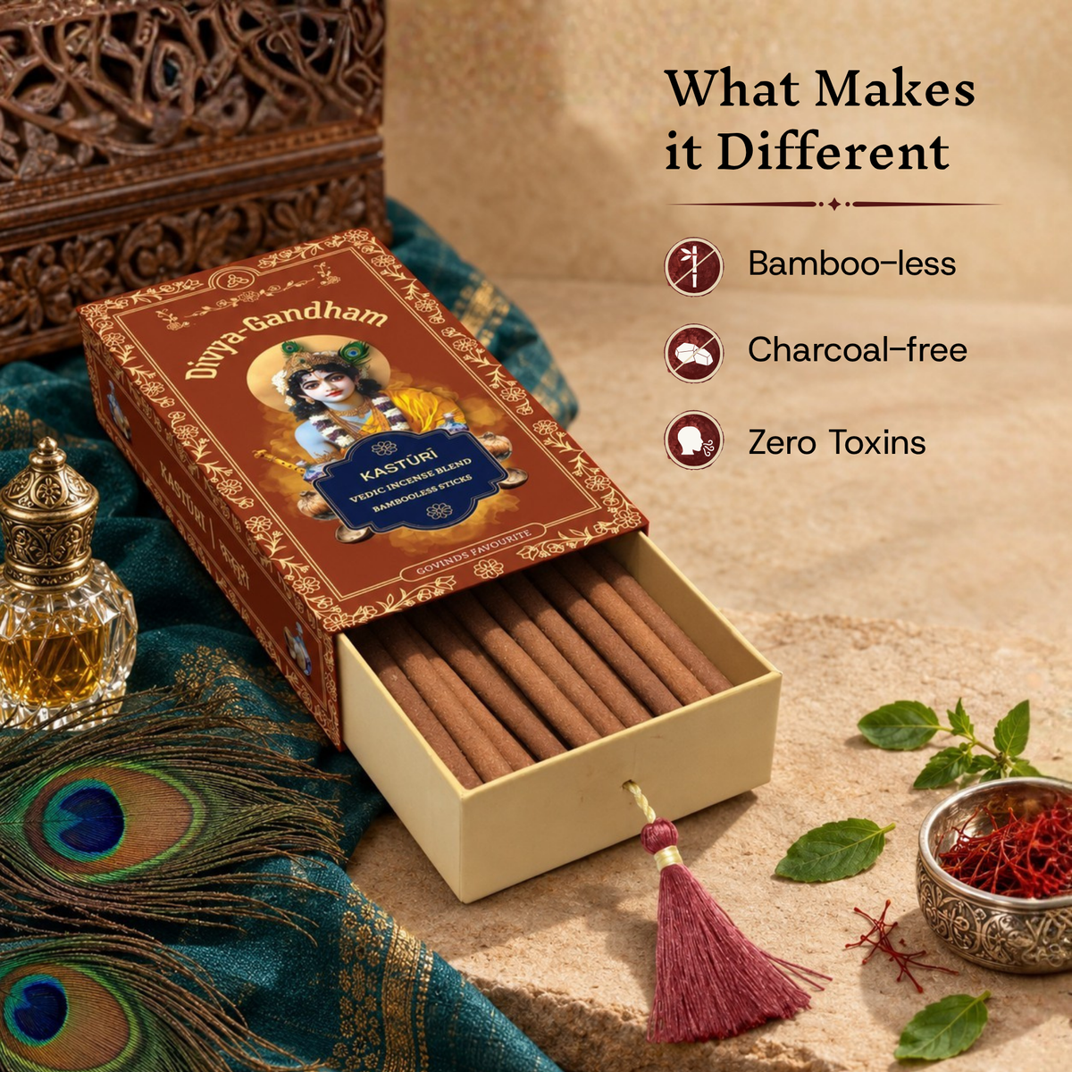 Open Divyagandham Kasturi incense sticks box emphasizing its bamboo-less, charcoal-free, and zero toxins qualities, placed near a peacock feather and a bowl of saffron.