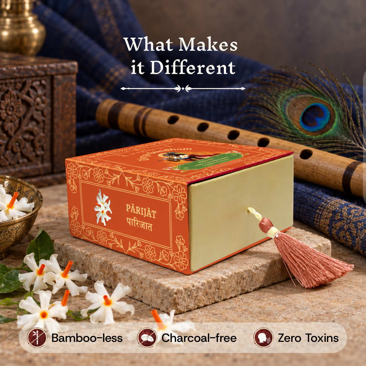 Divyagandham Parijat incense cones box emphasizing its bamboo-less, charcoal-free, and zero toxins qualities, placed near a wooden flute, peacock feather, and fresh parijat flowers.