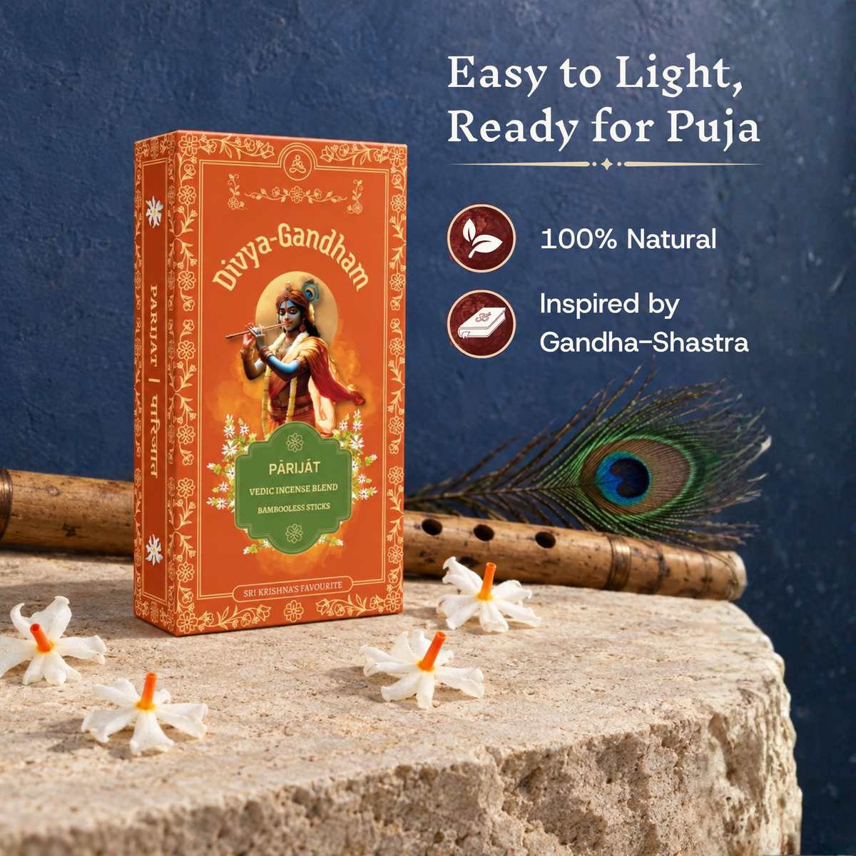 Divyagandham Parijat incense box highlighting it is easy to light, 100% natural, and inspired by Gandha-Shastra, placed on a textured stone surface alongside a flute and peacock feather.