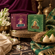 Two boxed sets of Divyagandham bambooless dhoop cones featuring Rajnigandha for Mata Mahalakshmi worship and Khus (Vetiver) for Lord Ganesha puja, displayed.
